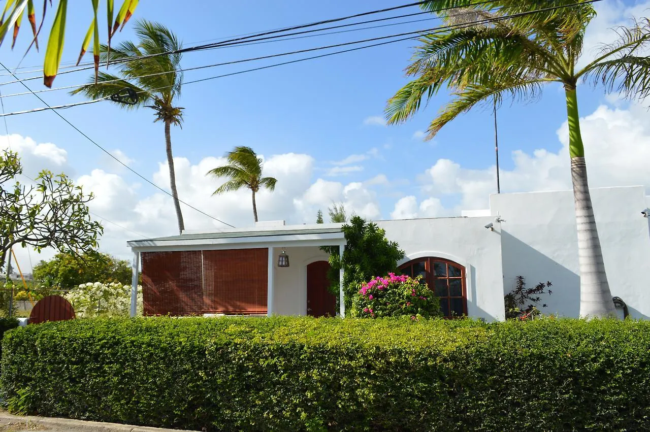 Kontakt z Frangipani Apartment